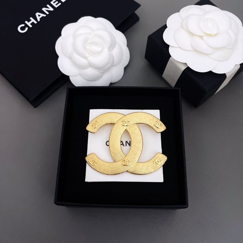 Ch*el brooches
